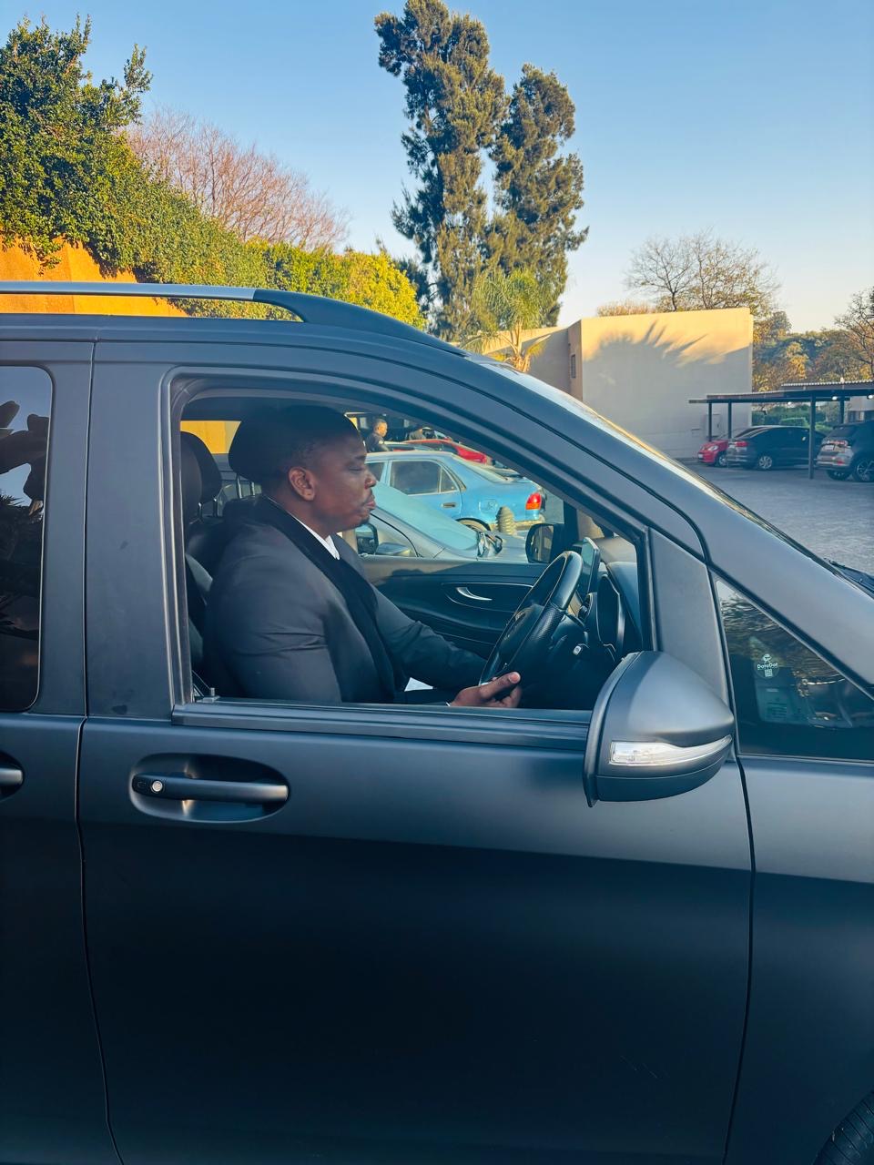 KM VIP Protection driver conducting pre-mission vehicle check